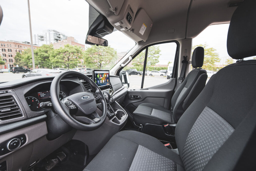 Drivers seat of a spacious Ford Transit van rental from Greenvans