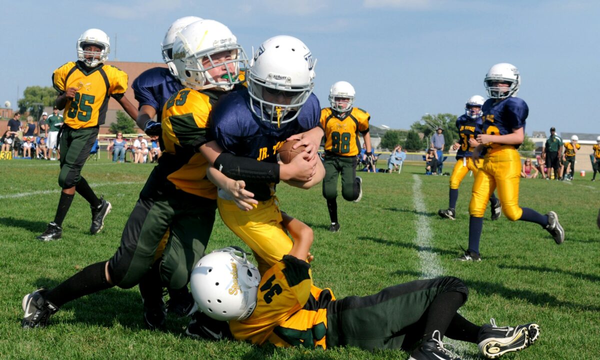 kids playing in a football championship