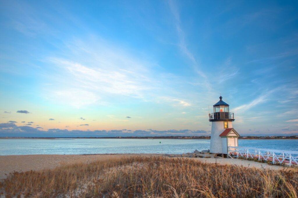 A lighthouse in front of the ocean in Cape Cod National Seashore