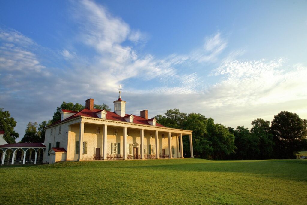 Mount Vernon against a landscaped yard on a sunny day