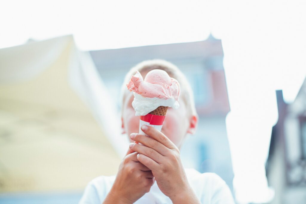 a child with an ice cream cone 